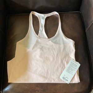 NWT lululemon tech mesh singlet in a pale pink color